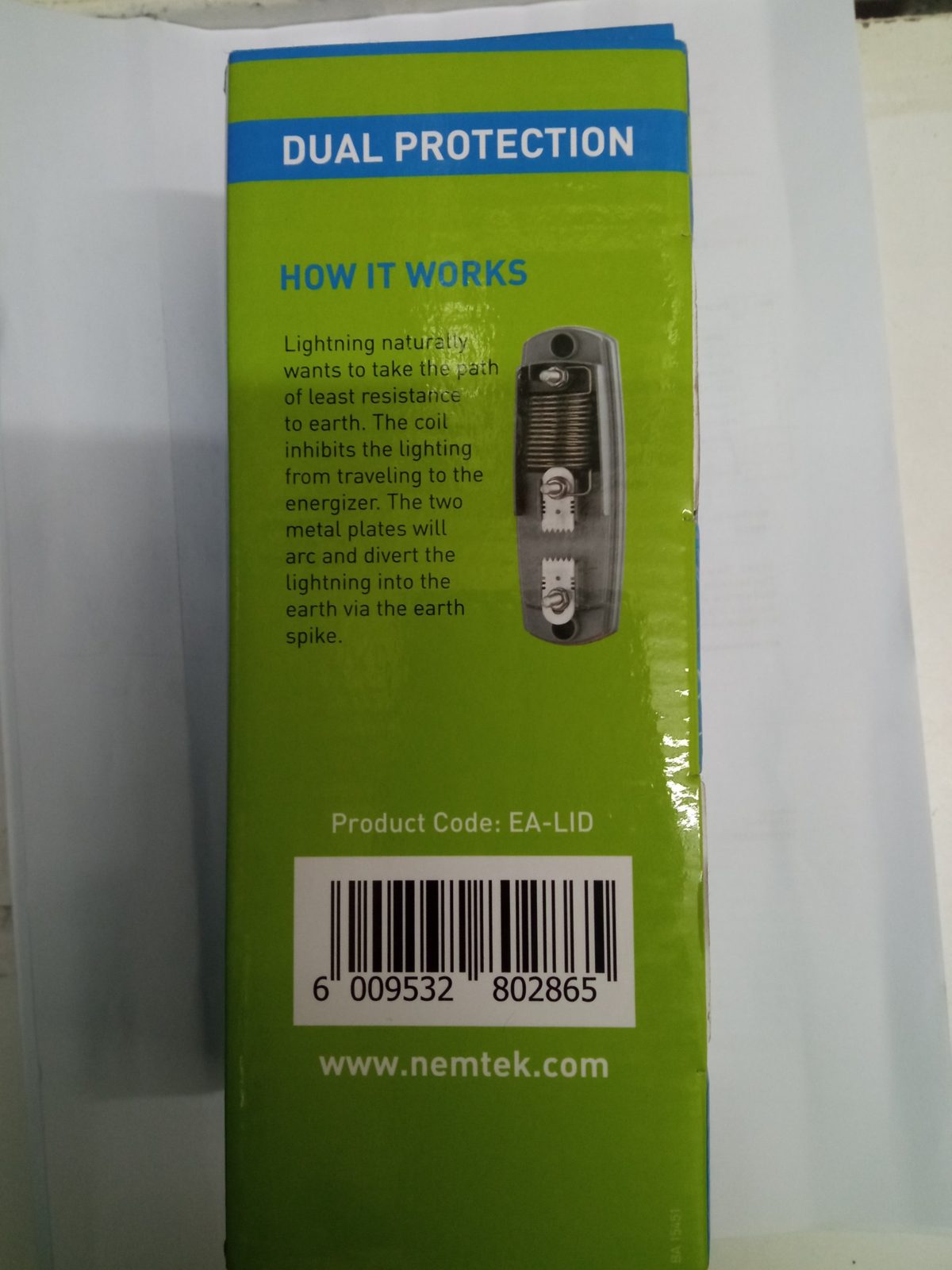 Nemtek lightning inhibitor and diverter packaging showing the coil and the two metal plates